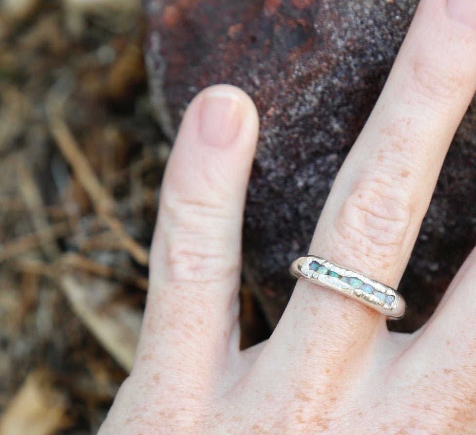woman wearing opal ring