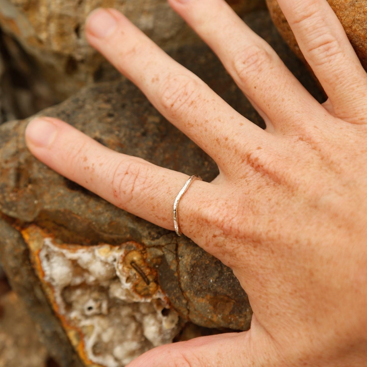 wearing mixed sized sterling silver rings