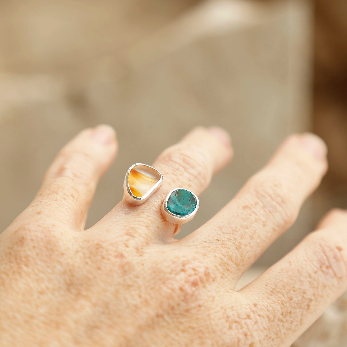 showcasing orange carnelian and blue green chrysocolla open ring handmade gemstone jewellery