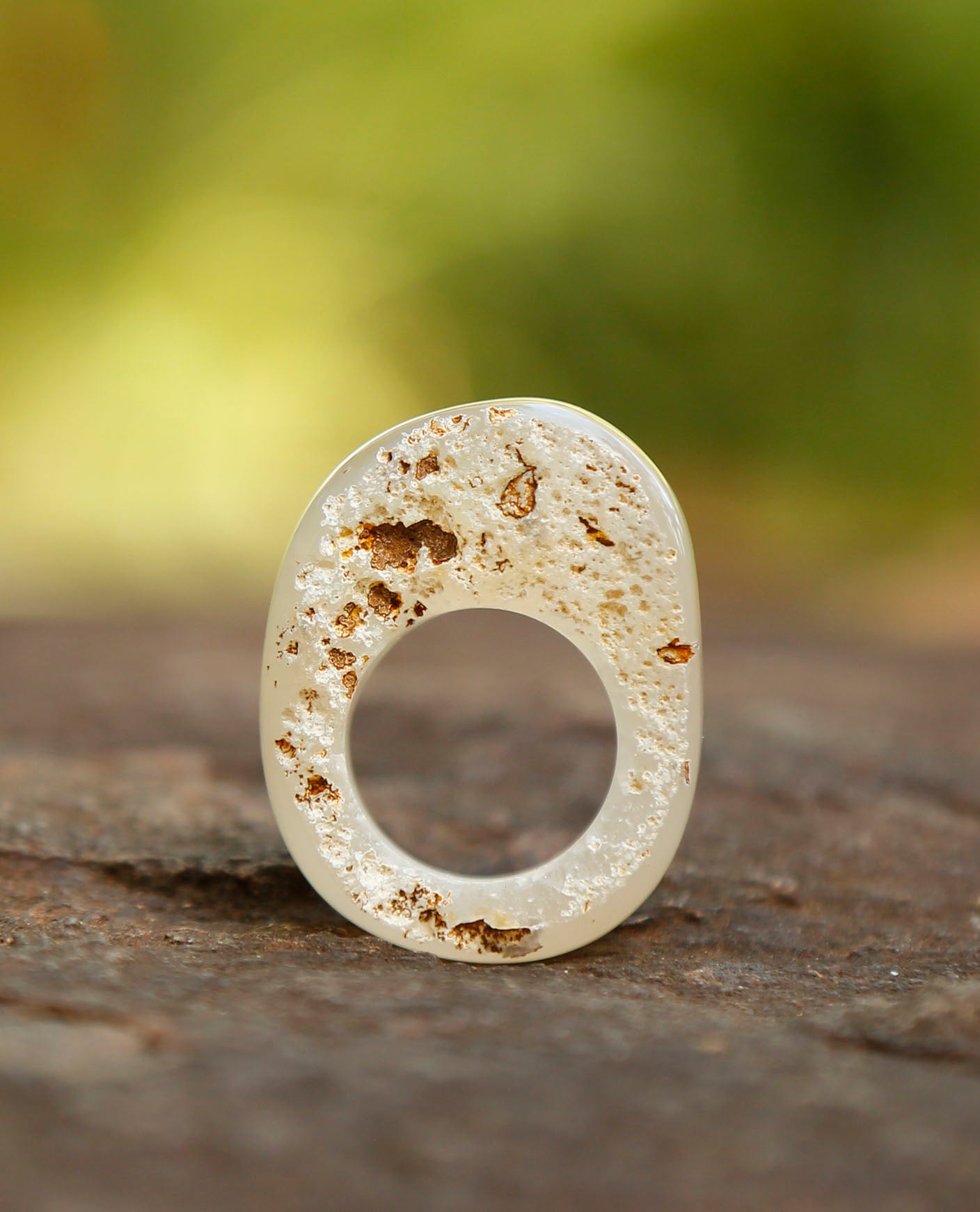 pitted | solid stone