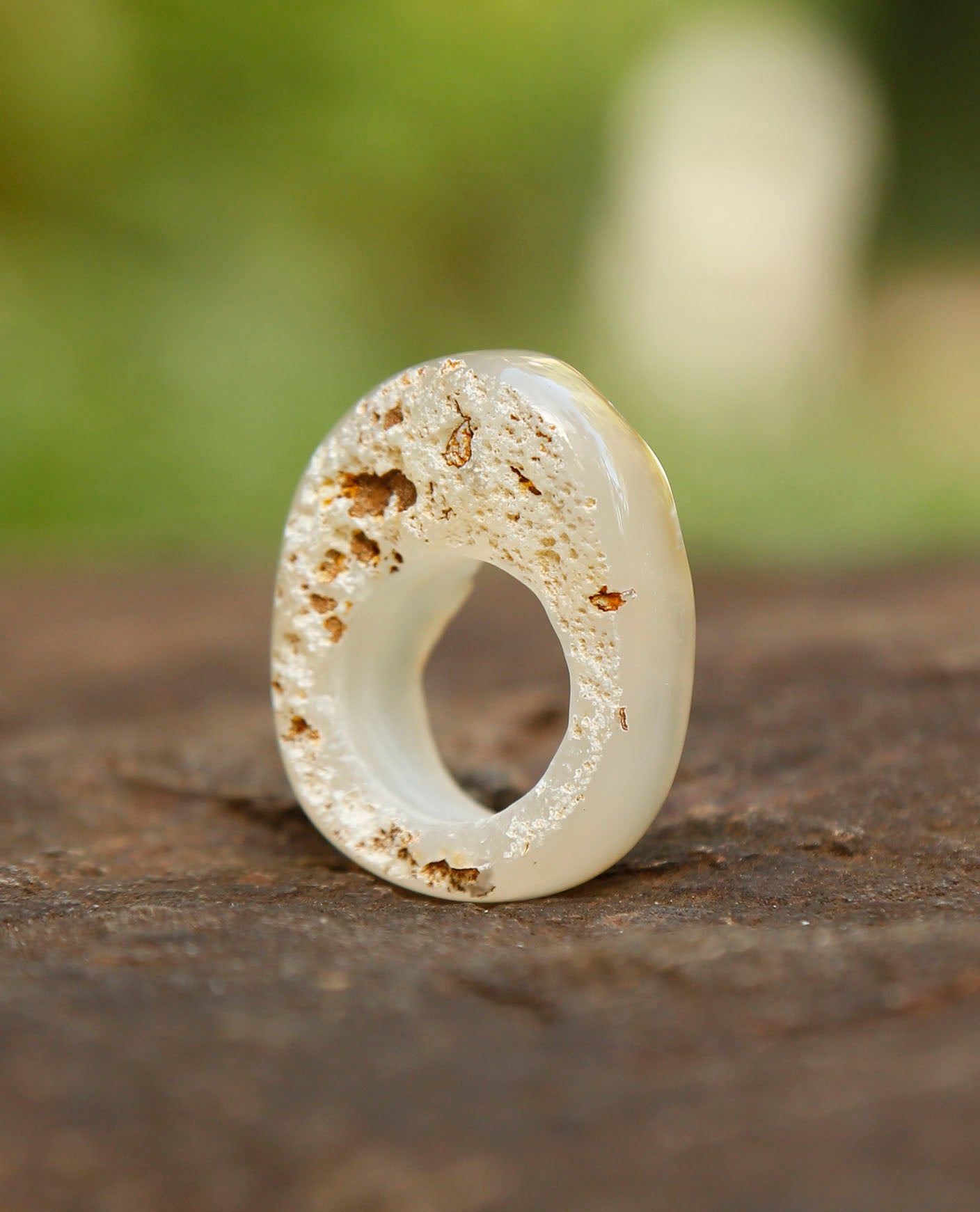 pitted | solid stone