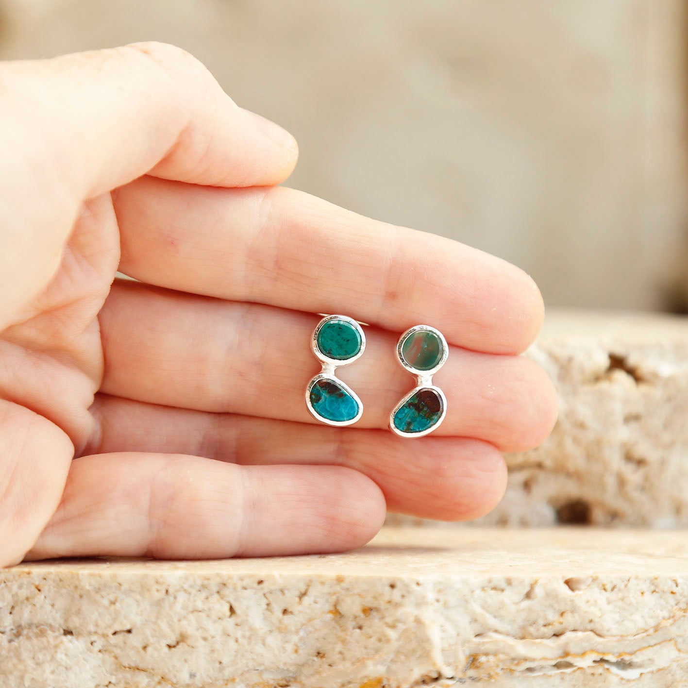 holding beautiful green Chrysoprase and blue green Chrysocolla earrings handmade gemstone jewellery